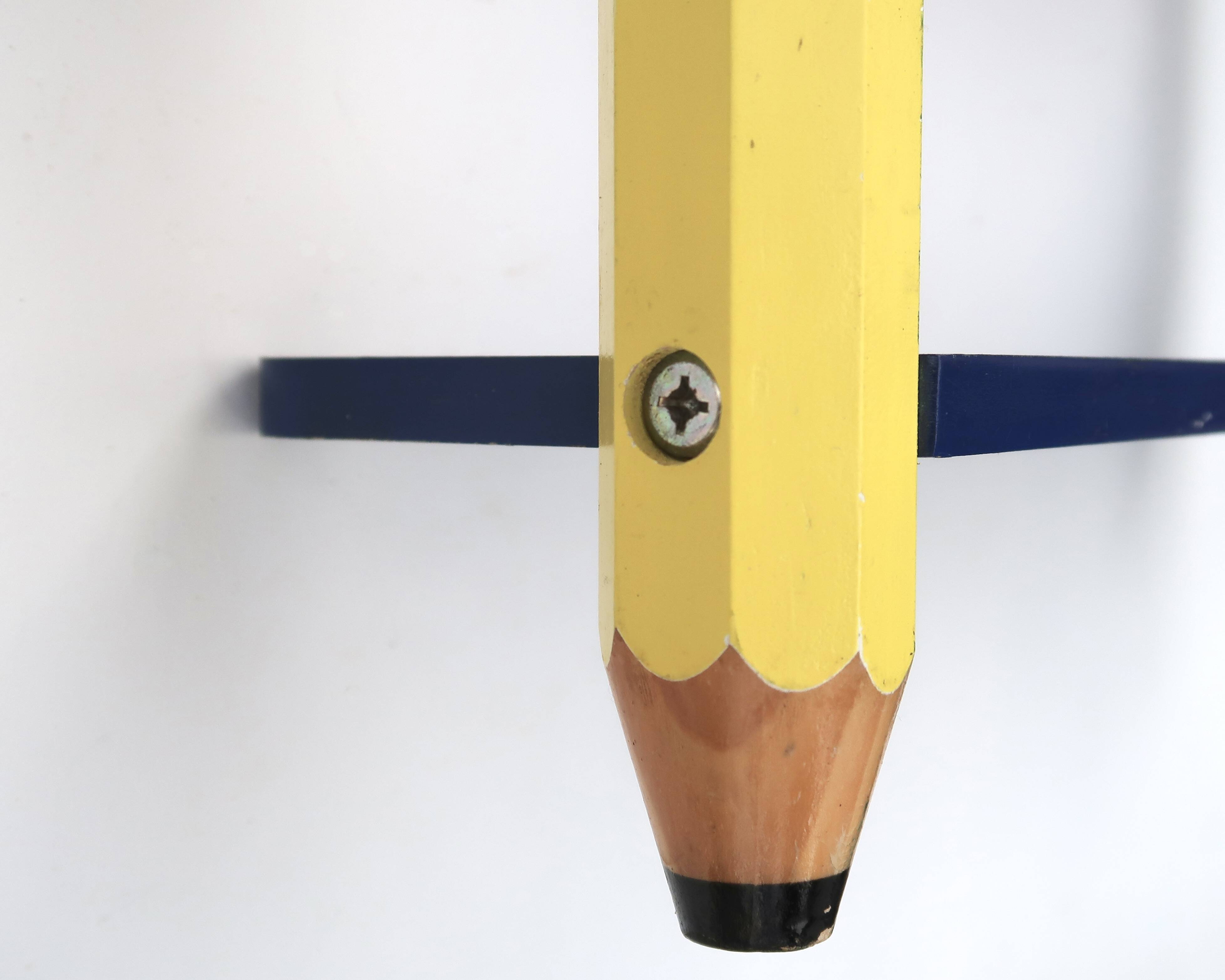 Wall shelf by Pierre Sala with giant pencils, 1980s.