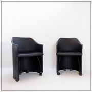 Pair of Artona armchairs in black leather by Afra and Tobia Scarpa for Maxalto.