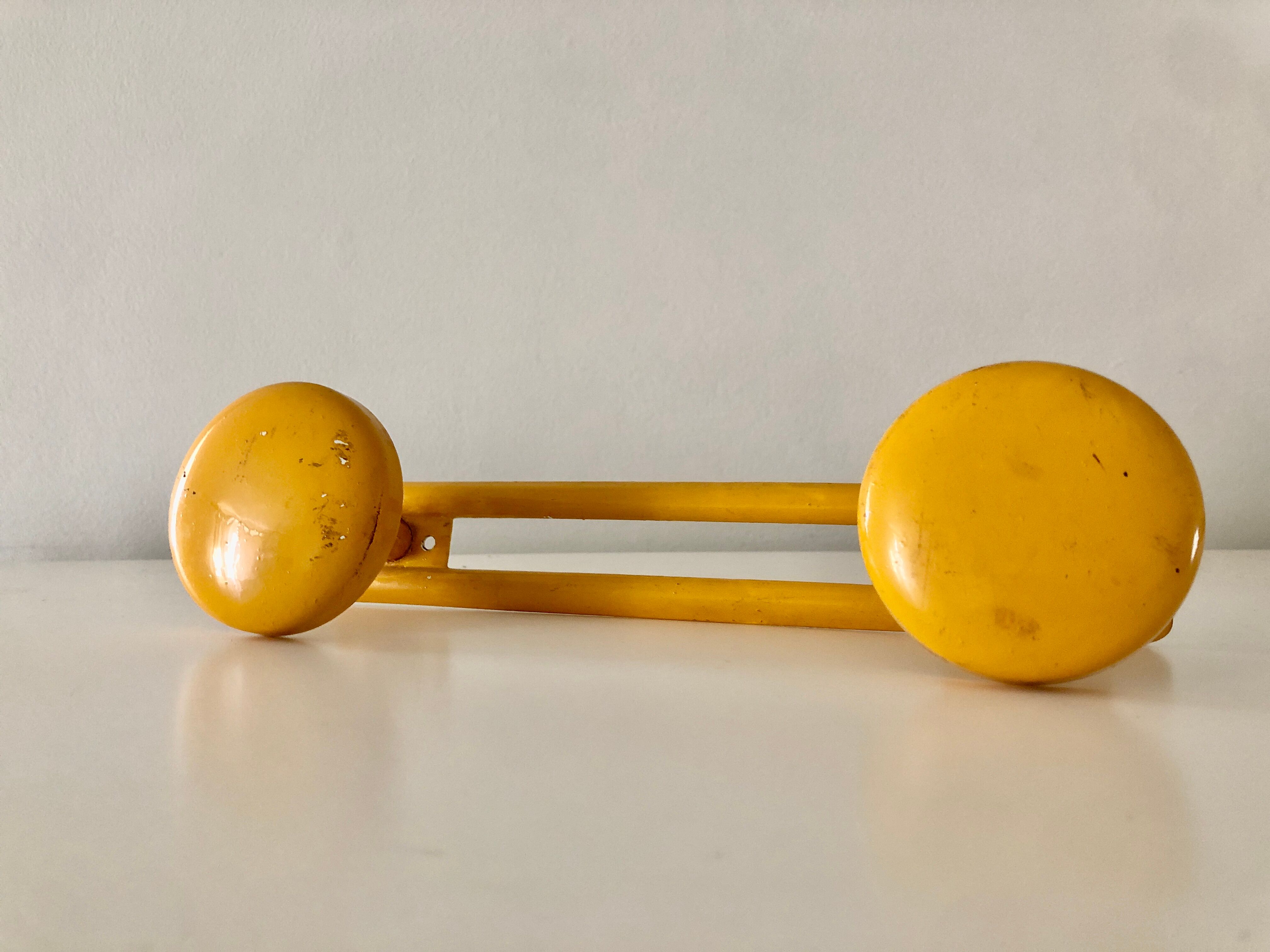 Yellow retro coat rack