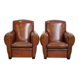 Set of 2 sheepskin design armchairs in the moustache model, in very nice condition