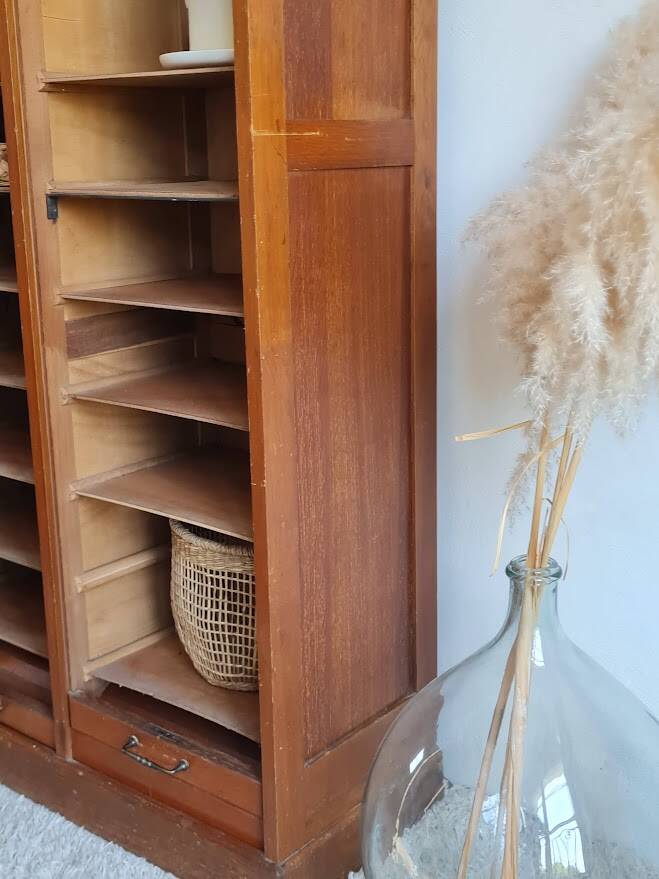 Vintage double curtain filing cabinet.