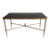Neoclassical brass coffee table with a black leather top and golden borders from Maison Jansen.