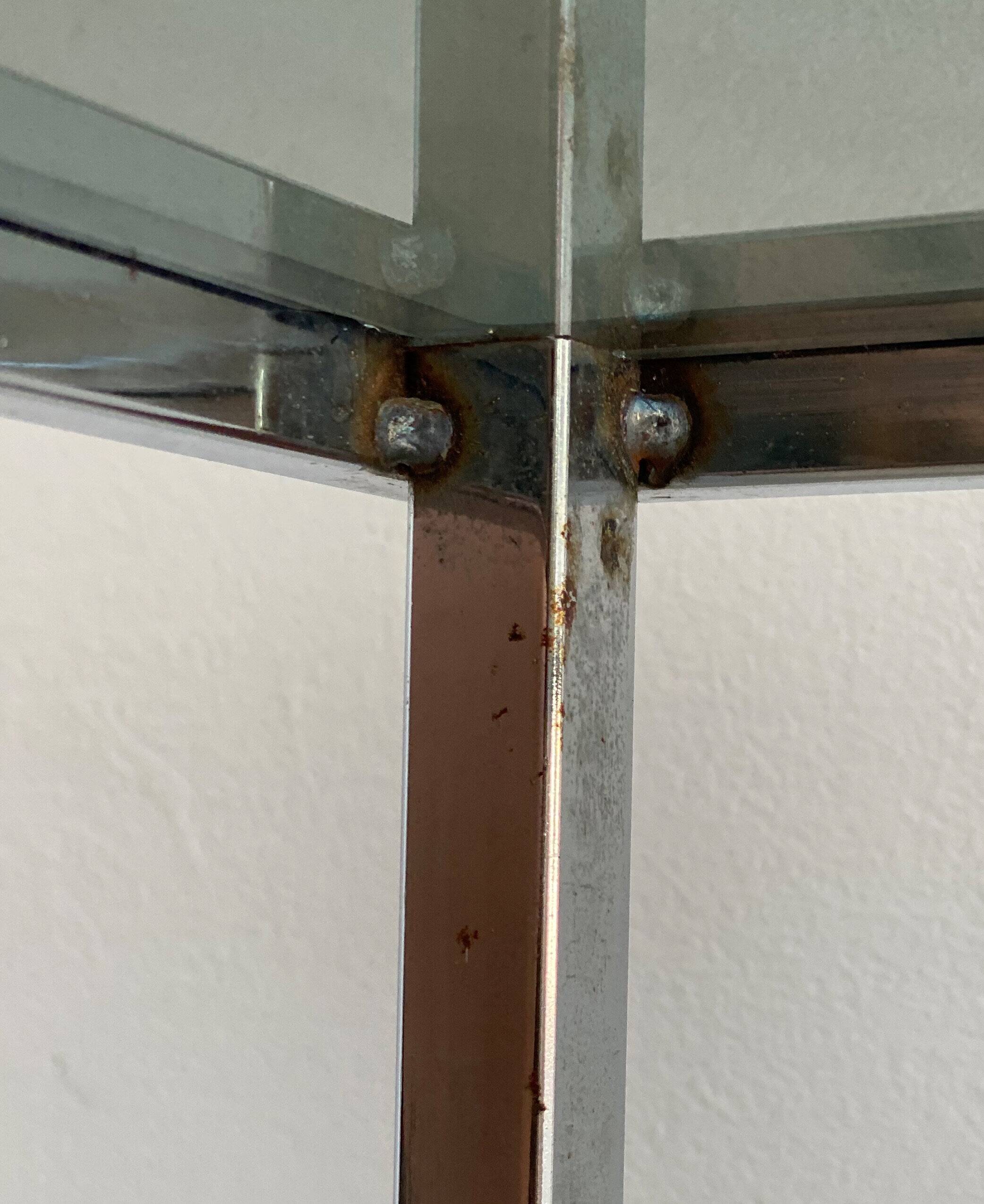 Vintage chrome side table with s smoked glass top