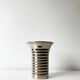 Vintage modernist striped polished aluminium vase