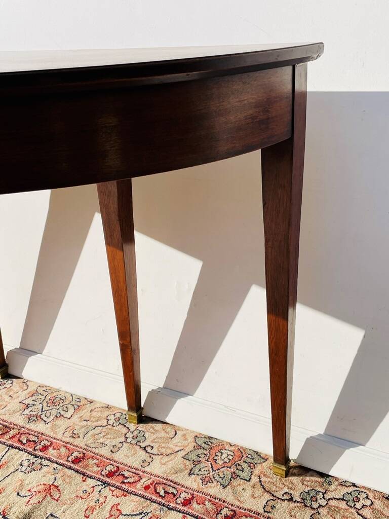 Empire-style demi-lune console from the 19th century.