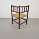 Corner chair in Arts and Crafts style made of oak with a rush seat, 1950s.