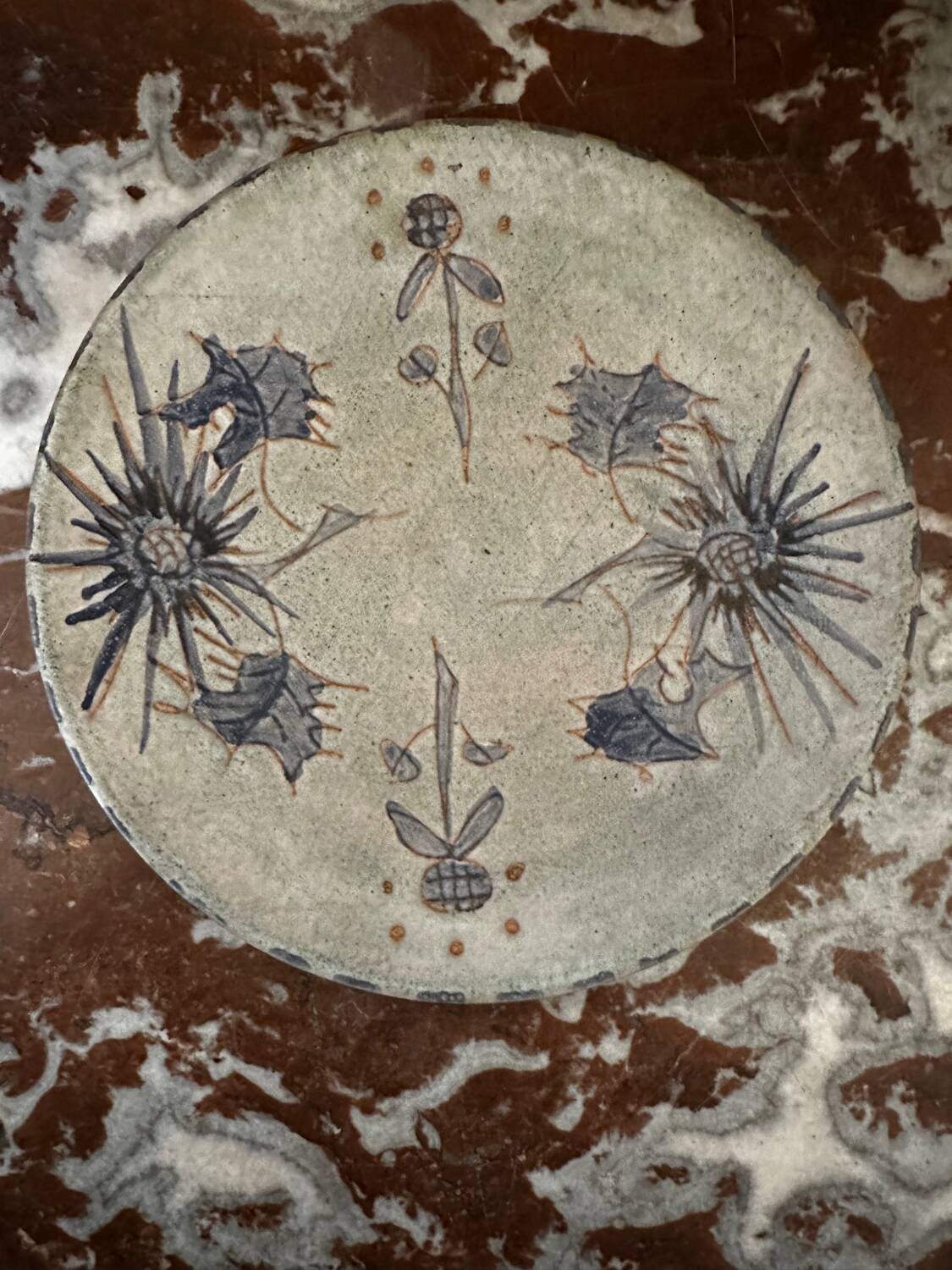 Ceramic plate signed by Marie-Madeleine Jolly – thistle decoration – year