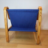 Scandinavian curved wooden armchairs