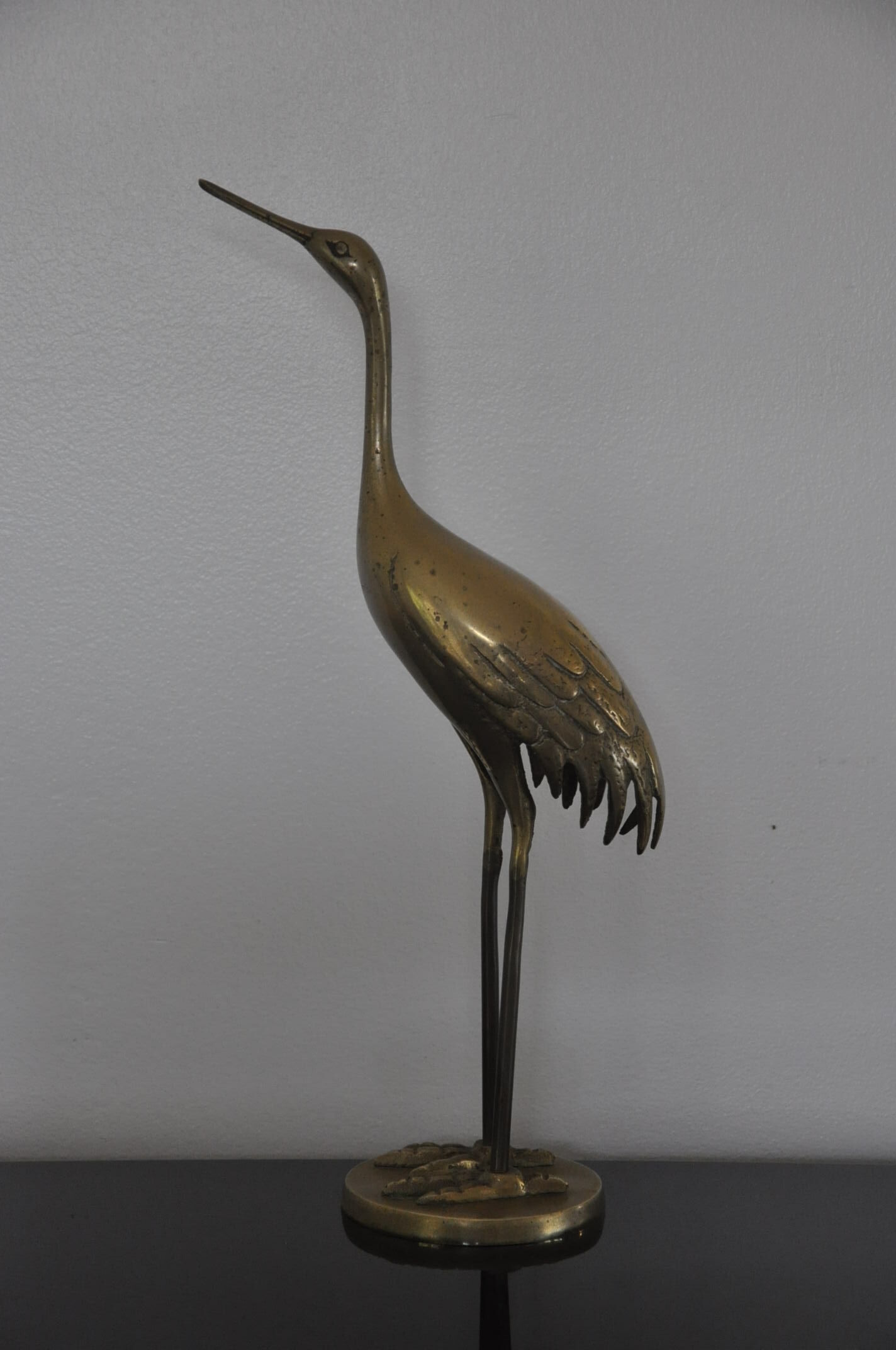 Vintage bronze statue wader