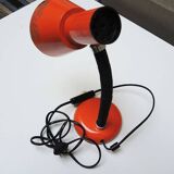 Old orange enameled sheet metal lamp