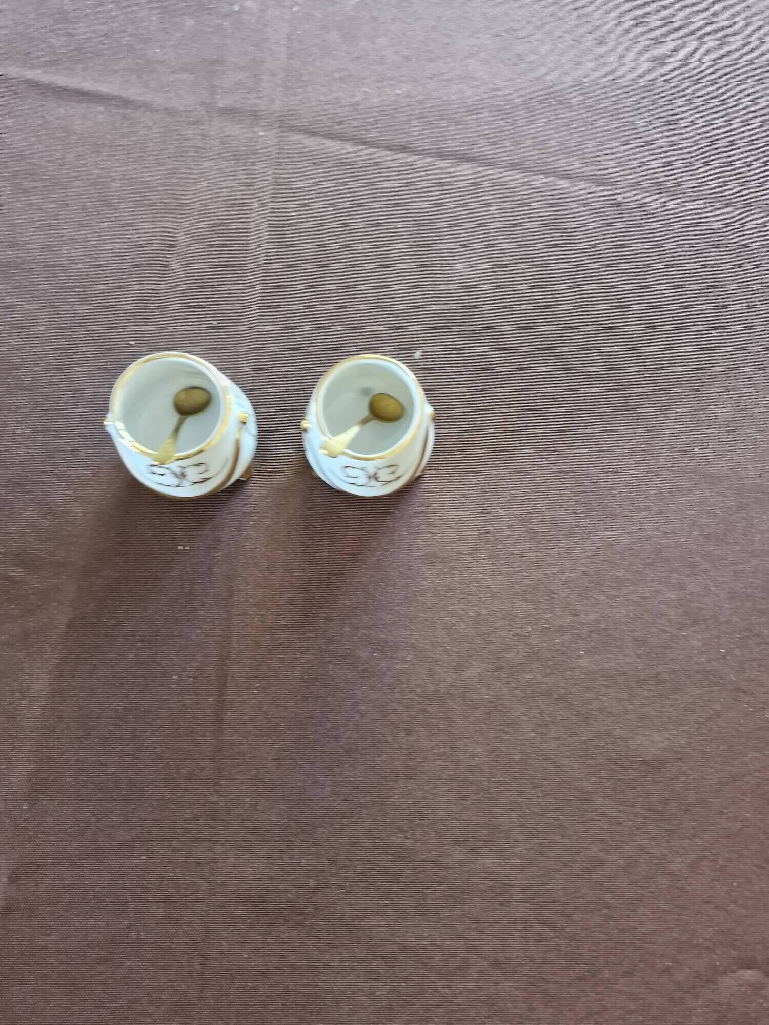 Vintage porcelain salt and pepper shakers.