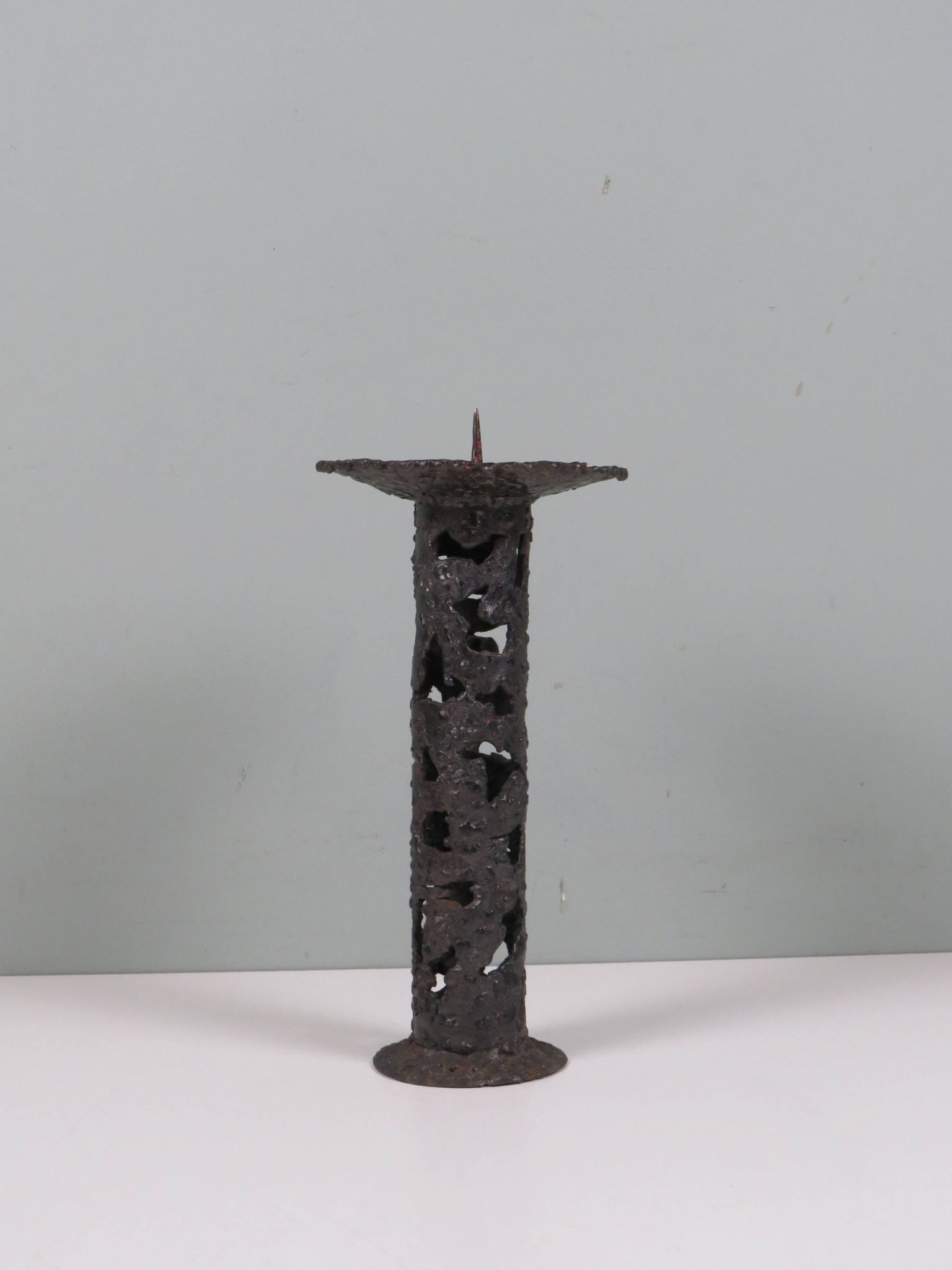 Brutalist wrought iron chandelier, European craftsmanship, 1960s.