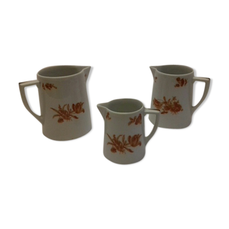 1 set of 3 porcelain pitchers