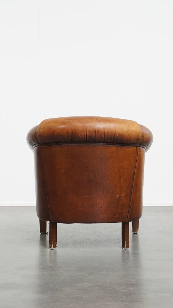 Fauteuil club en cuir de mouton couleur cognac