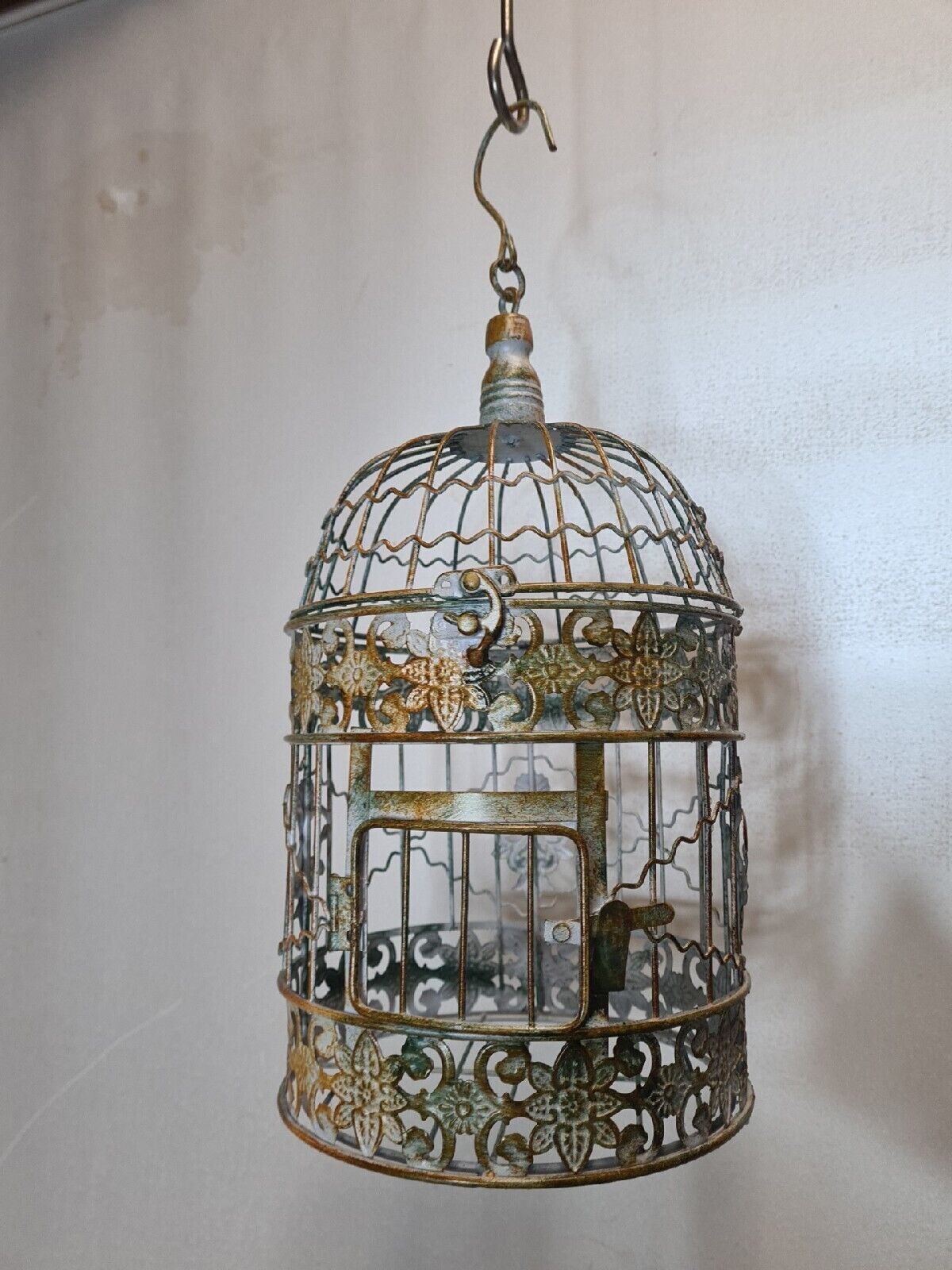 Round weathered iron birdcage