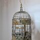 Round weathered iron birdcage