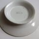 Old round footed plate signed Labrut brothers flowers