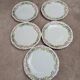 Set of 5 Limoges porcelain dessert plates in Art Nouveau style.