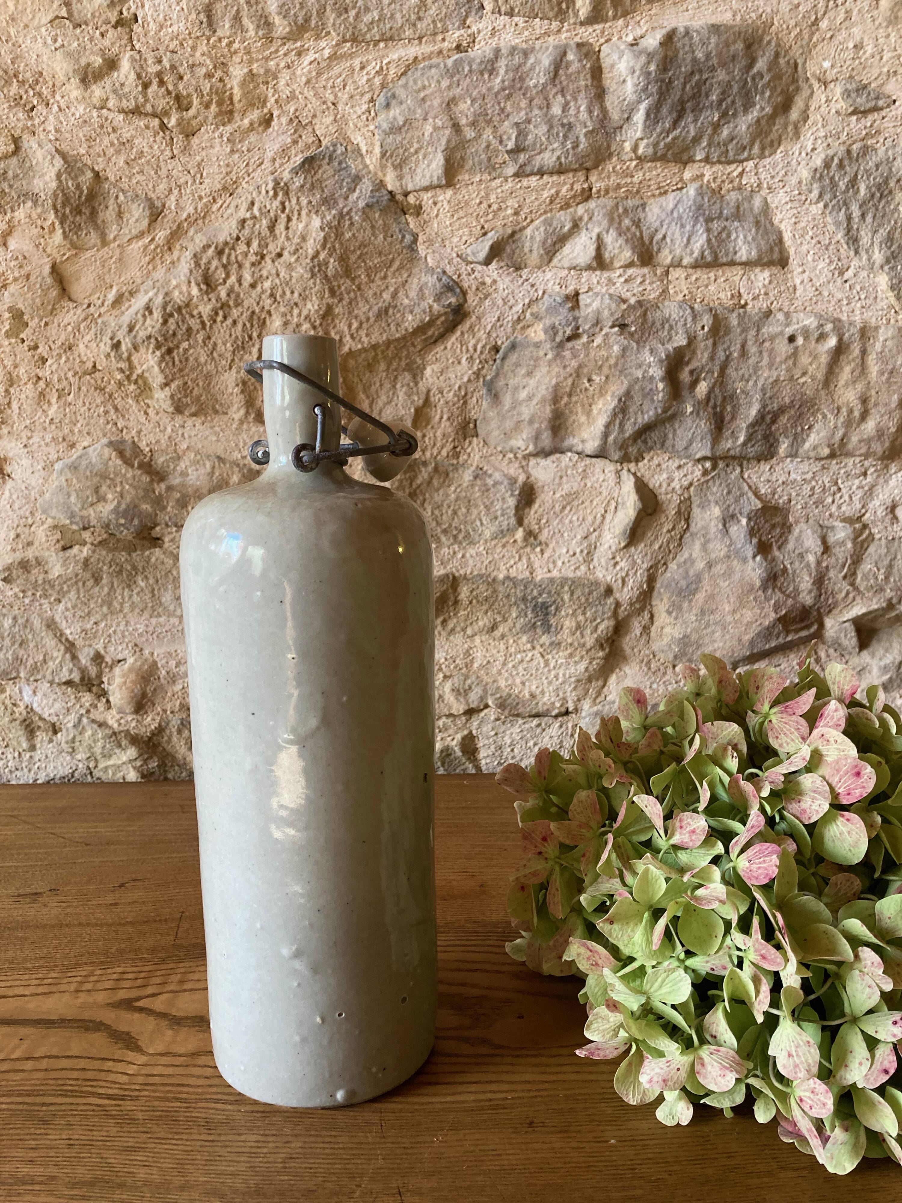 Bouteille bouillotte en grès émaillé gris clair