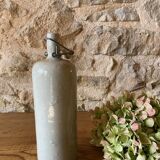 Hot water bottle in light gray enamelled stoneware