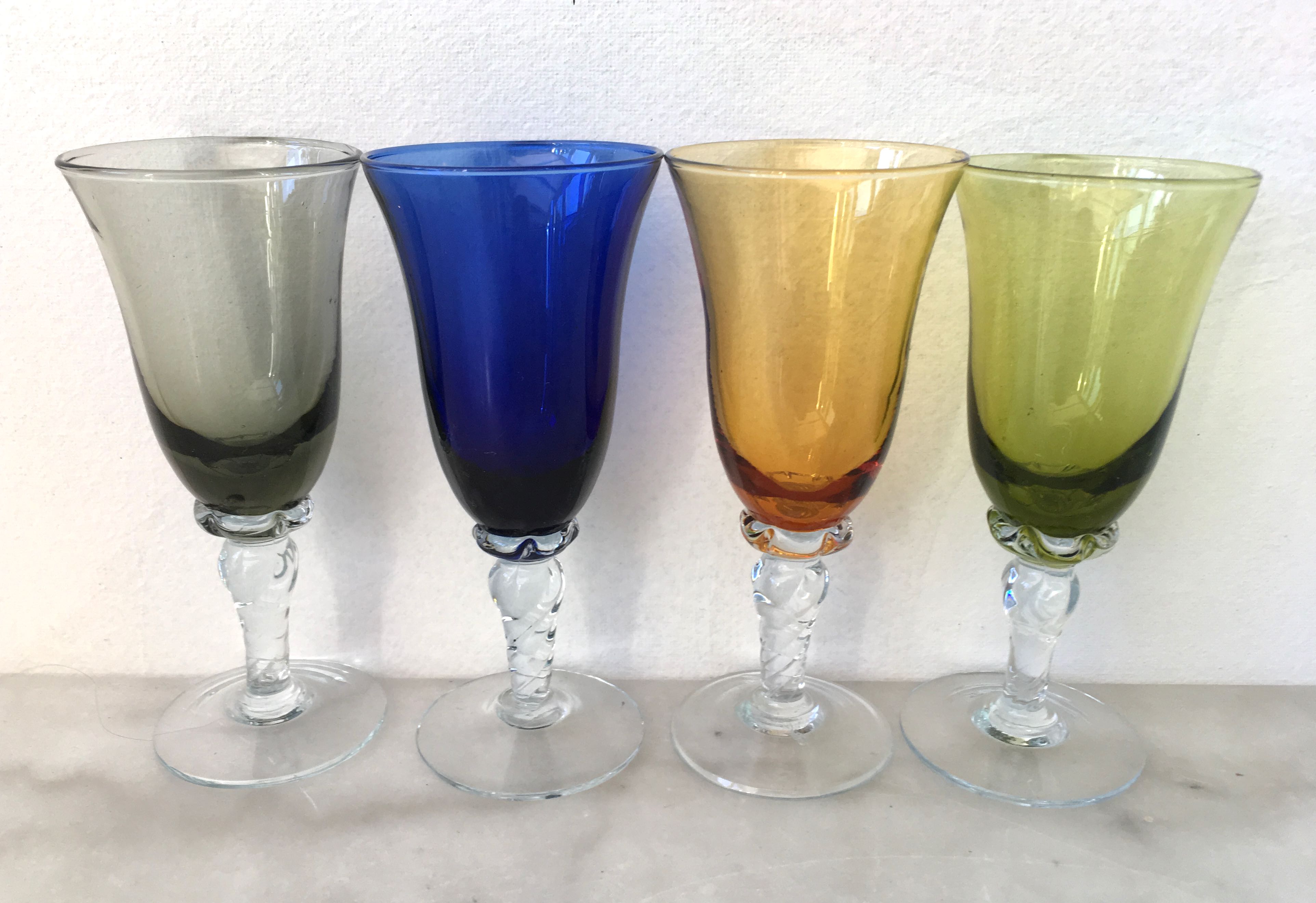 Set of four colored blown glasses