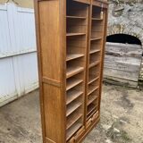 Double-column oak filing cabinet with curtains, 1950s.