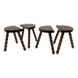 Series of 4 small tripod stools with half-moon seat and beaded turned wood legs