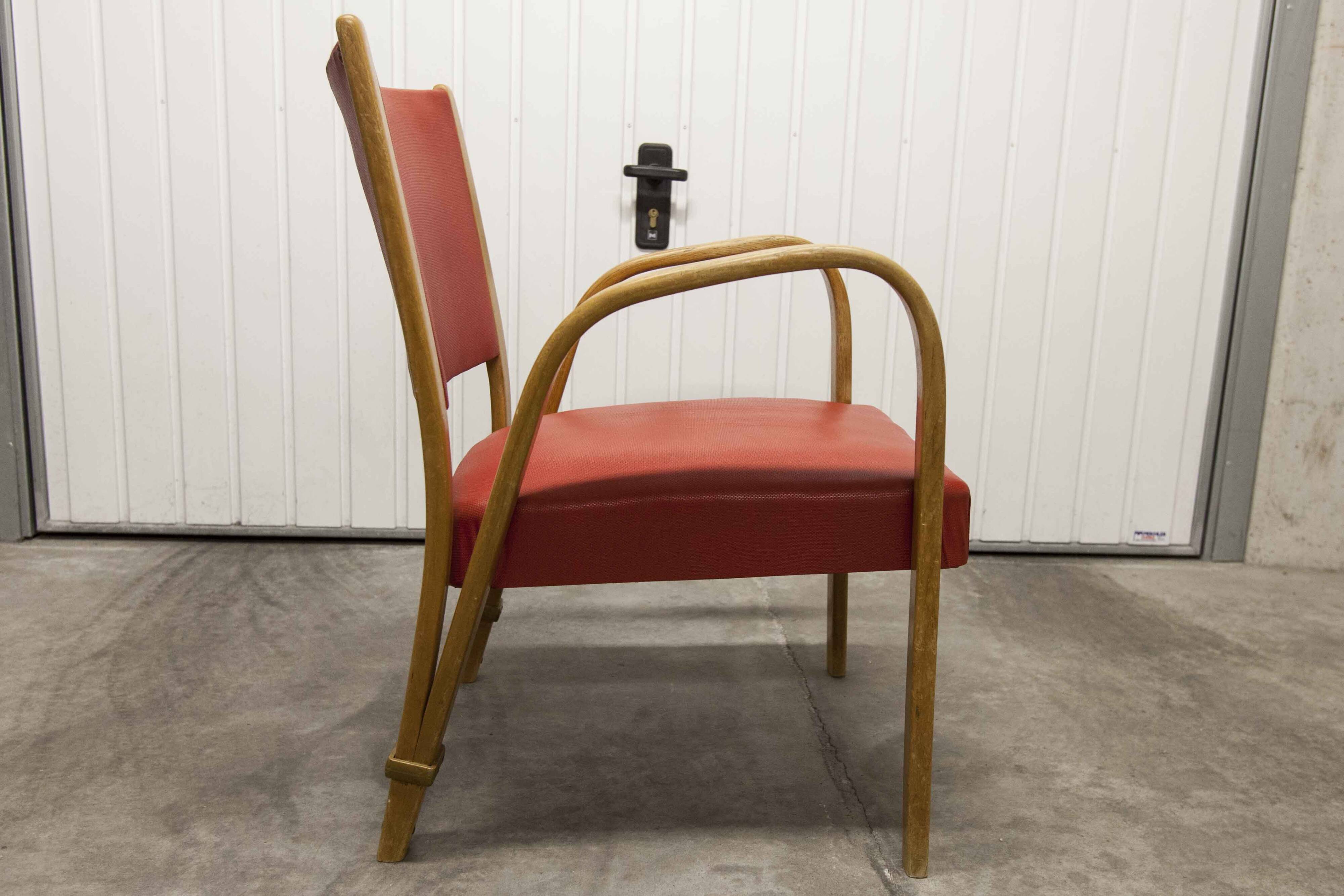 Bow wood armchair by Hugues Steiner 1960 red
