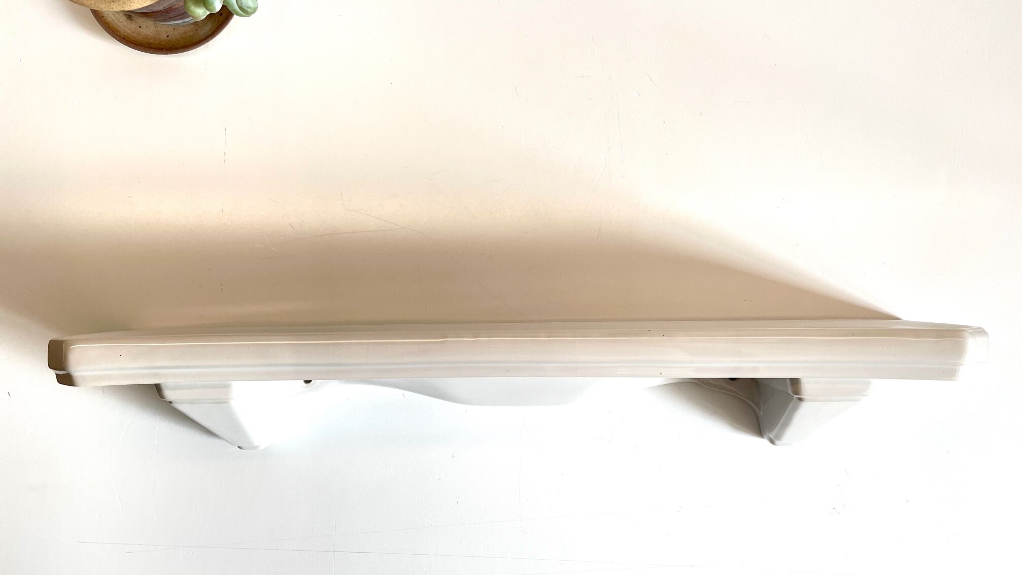 Vintage ceramic wall shelf