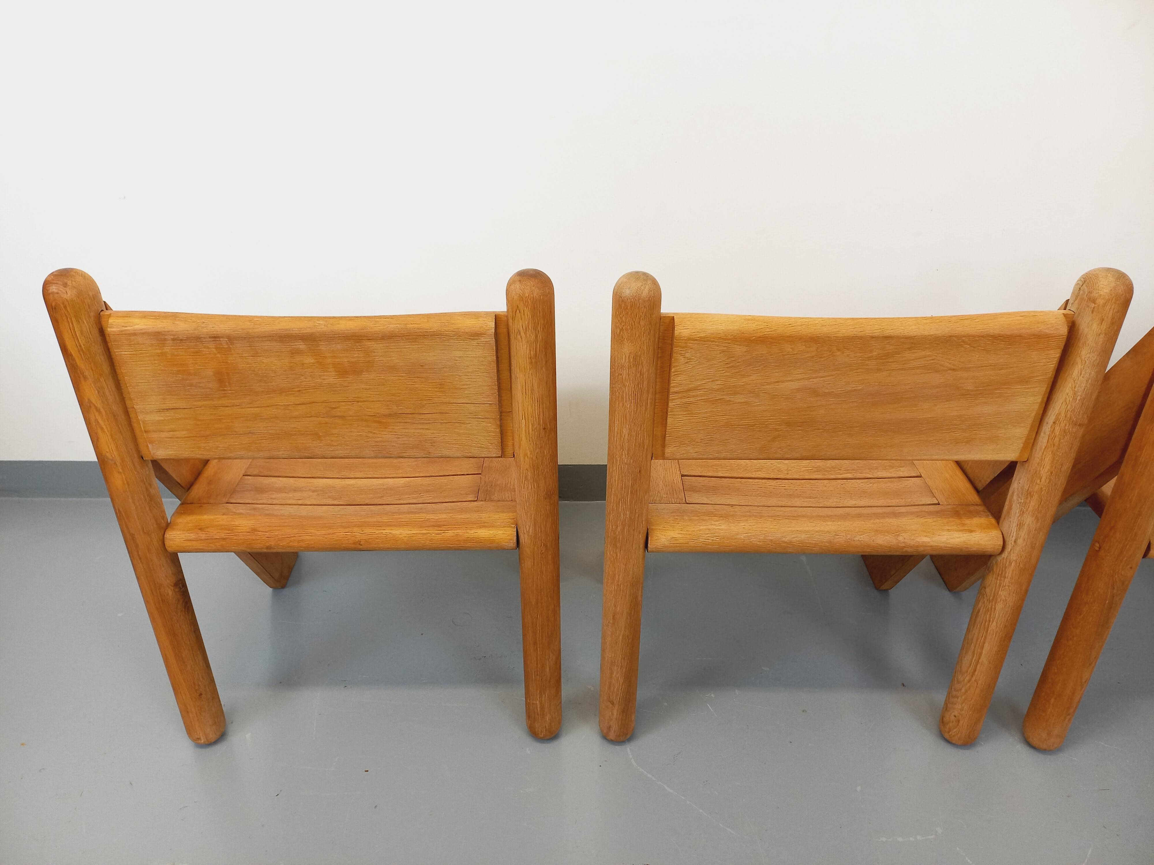 Set of 4 vintage brutalist chairs in solid oak from the 1960s.