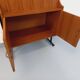Vintage modular secretary bookshelf in teak and metal.