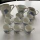 Coffee service in white porcelain pattern pink blue art deco