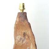 Brutalist sandstone lamp with raffia lampshade