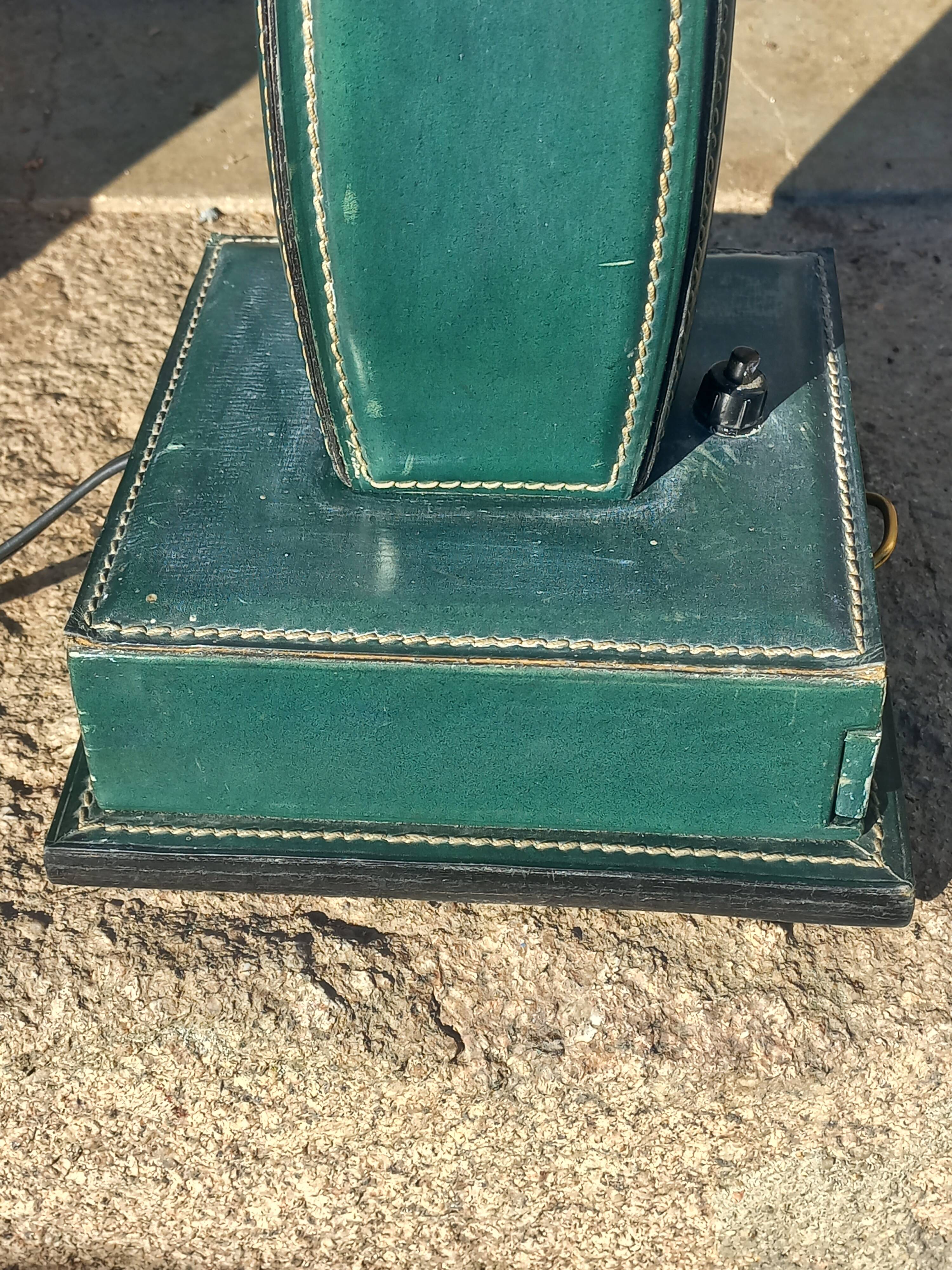 Vintage leather desk lamp with saddle stitching from the 1960s.