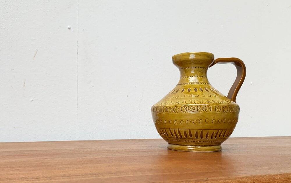 Italian pottery carafe from the mid-century by Aldo Londi for Bitossi, 1960s.