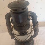 Old ALG storm lamp. Height 34 cm. Broken glass.