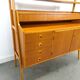 Teak fineer kast uit Zweden met lades, legplank en uitschuifbare plank