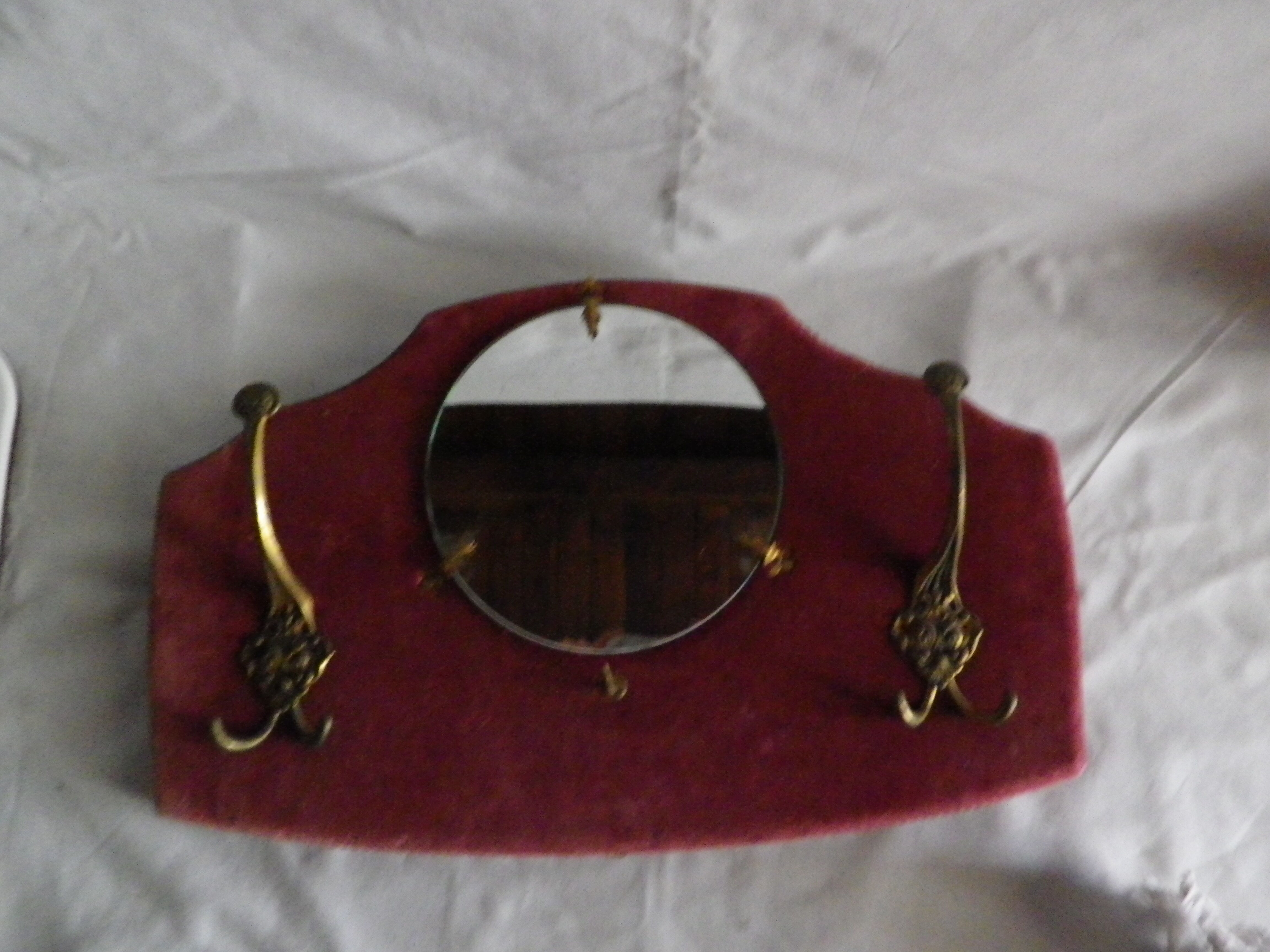 Mirror on red velvet