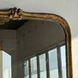 Large gilded mirror 19th century rounded corners mercury glass Louis XVI style