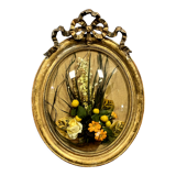 Louis XVI gilded wooden medallion frame with floral arrangement