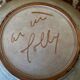 Ceramic plate signed by Marie-Madeleine Jolly – thistle decoration – year