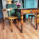 Antique farmhouse table and bistro chairs