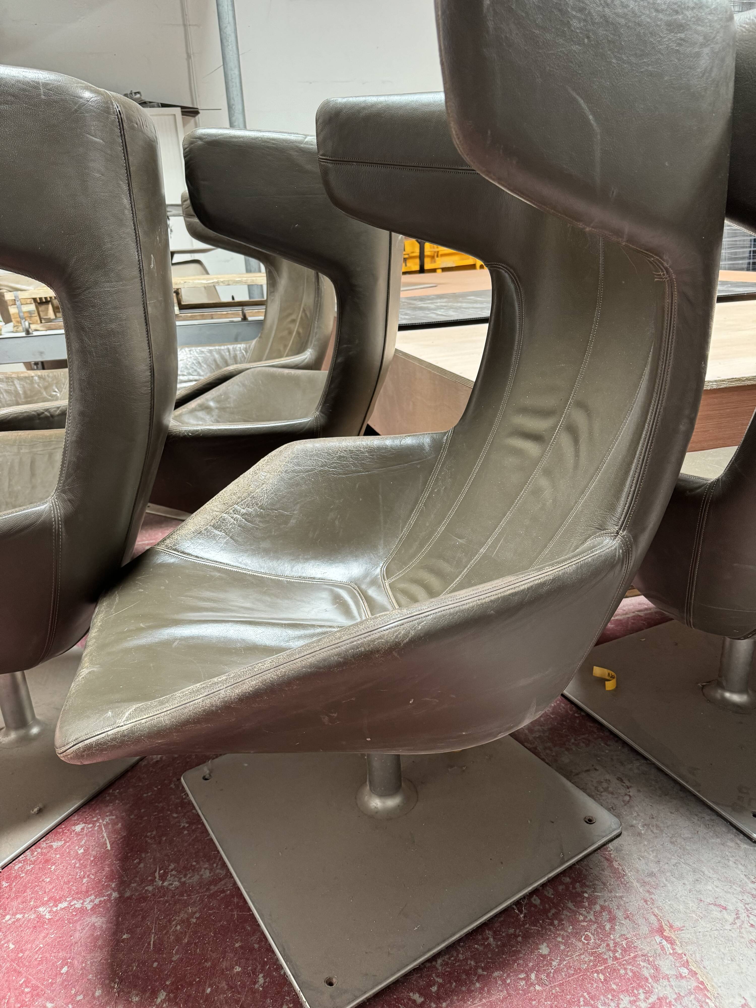 Moroso swivel leather armchair with headrest