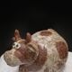 Cracked sandstone cow
