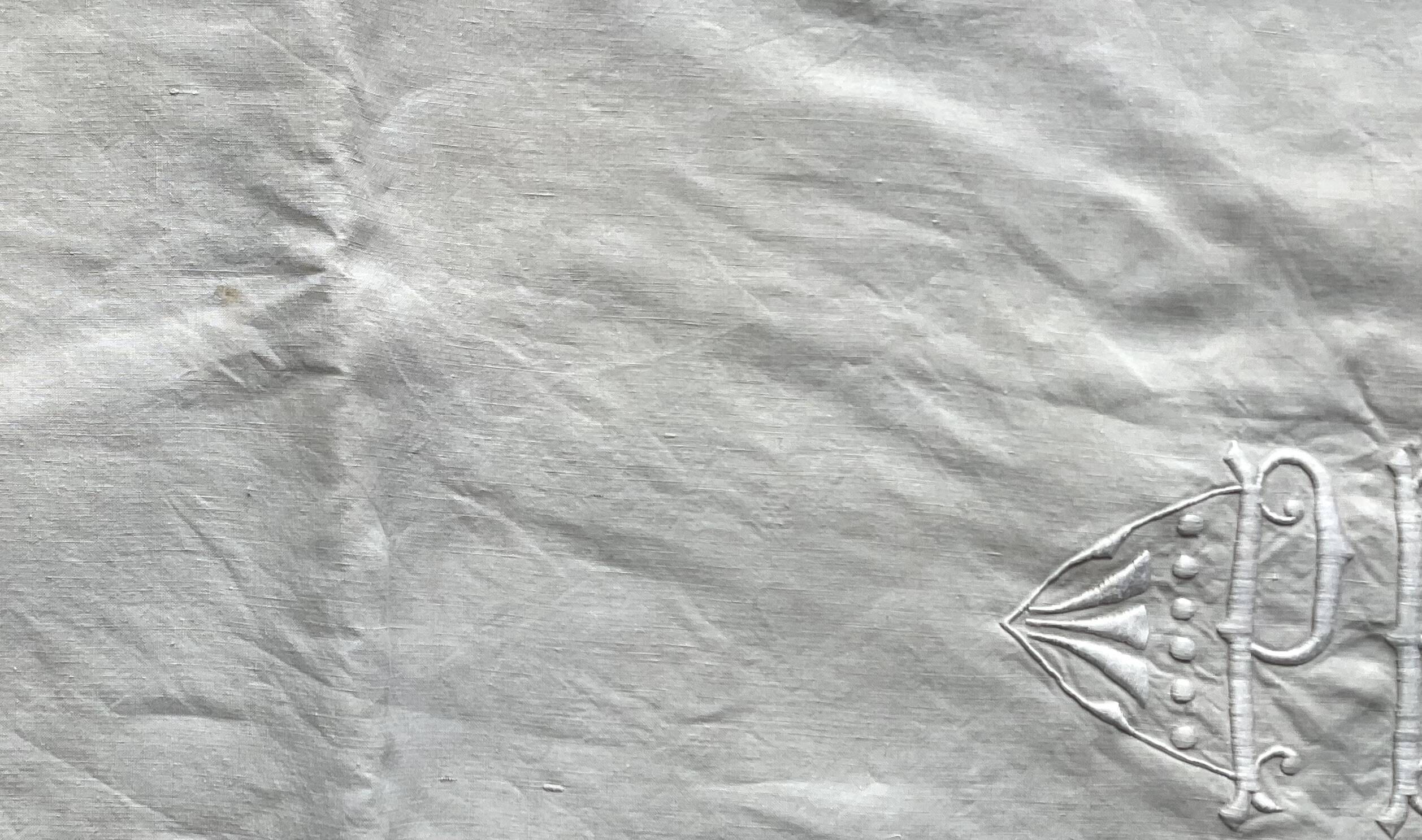 Old hand-embroidered linen sheet