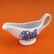 White porcelain gravy boat, fruit basket decor