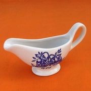 White porcelain gravy boat, fruit basket decor
