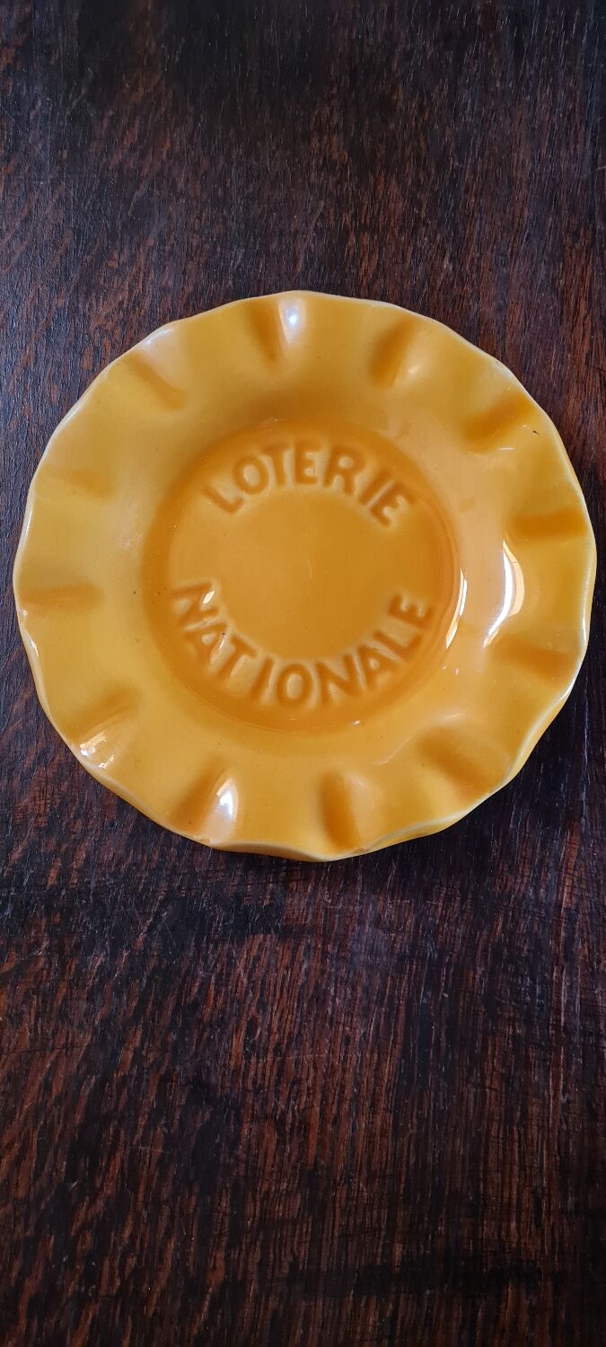 National lottery ashtray yellow
