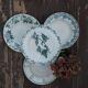 Lot of four mismatched hollow plates