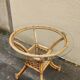 beautiful 1970s bamboo and rattan dining table with a glass top